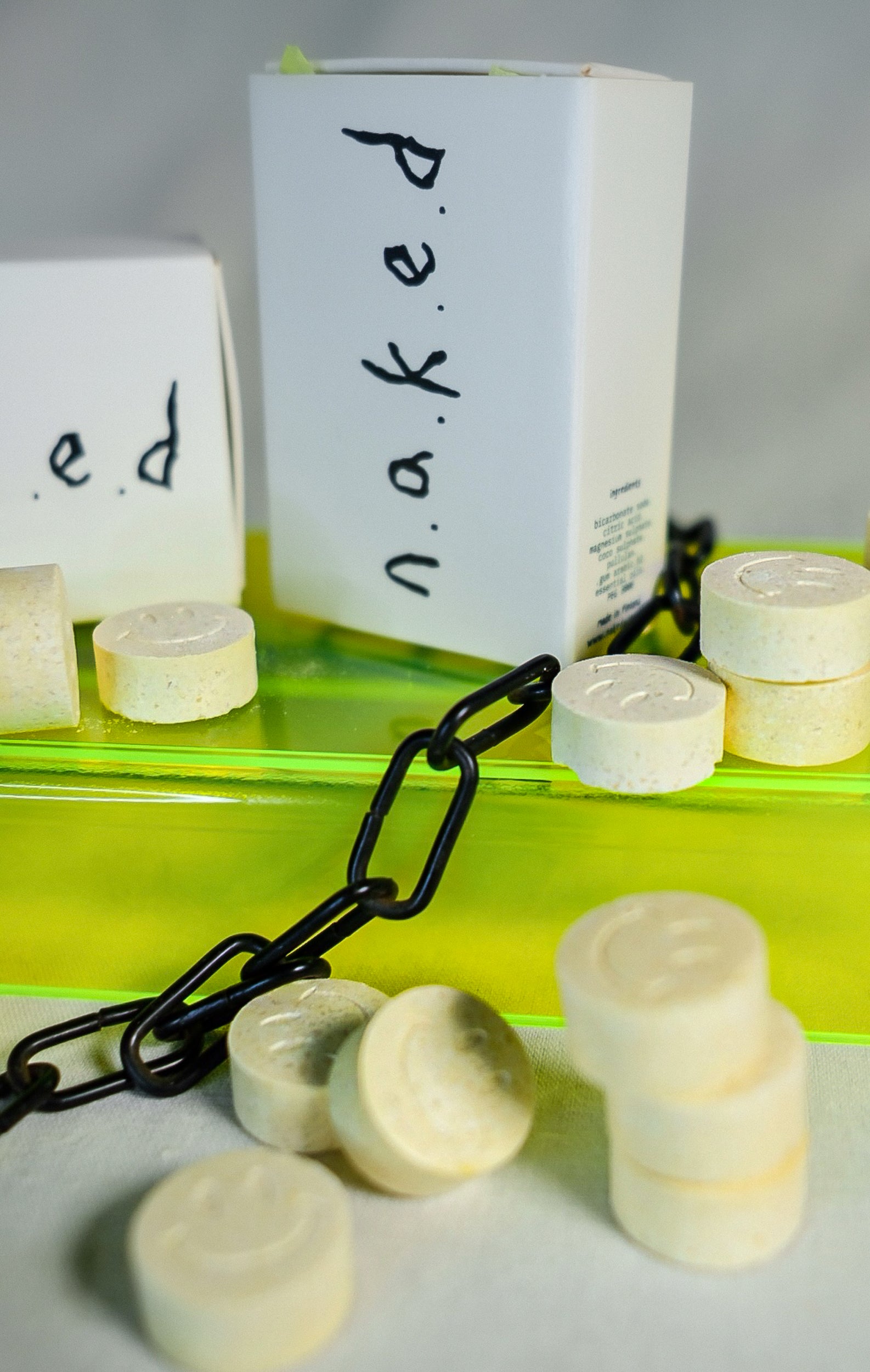 n.a.k.e.d cleaning pills with smiley face